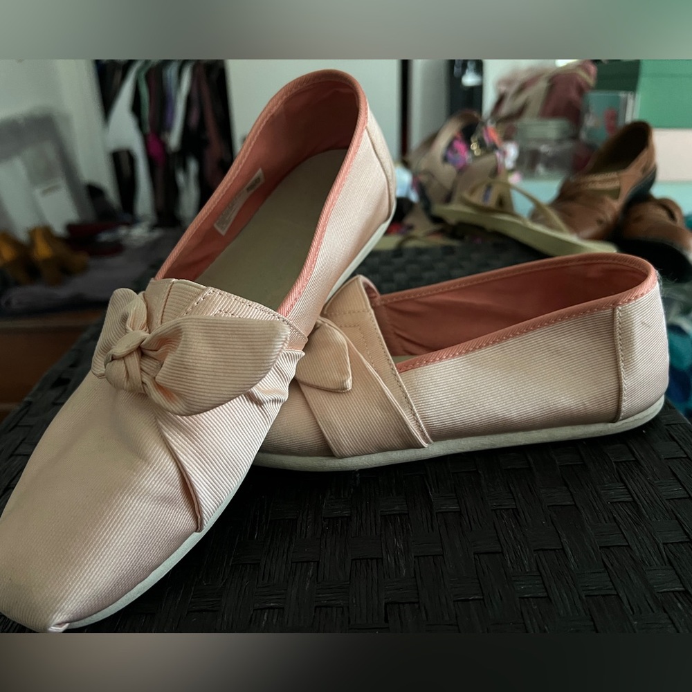 Pink Tom's slip-ons, size 9.